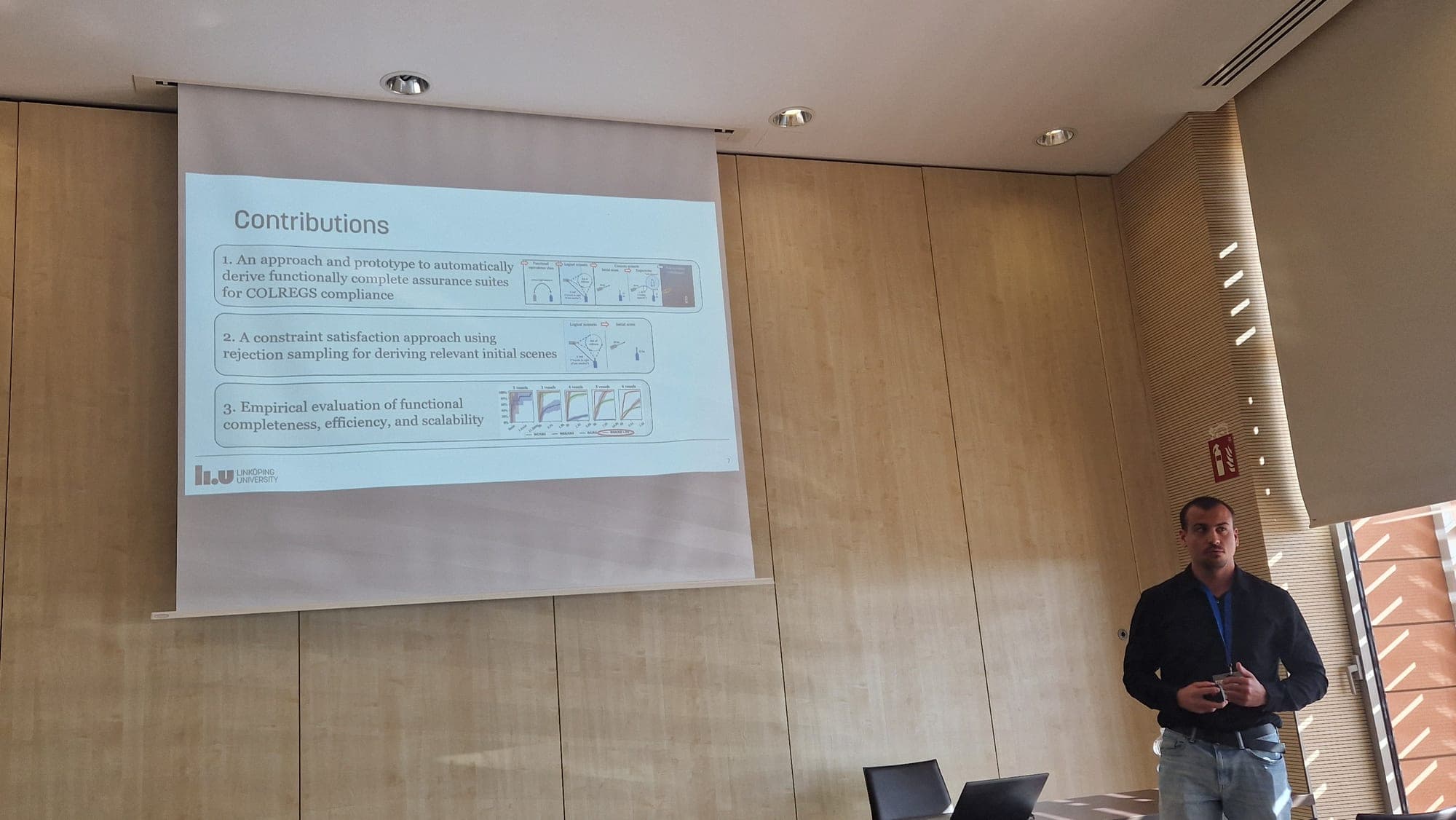 Dominik presenting the contributions slide of the MODELS 2026 research paper